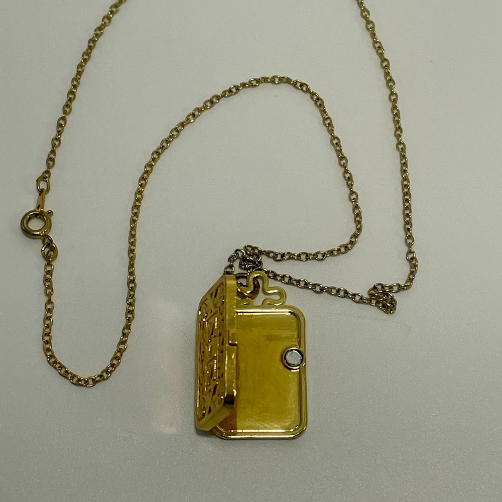 Locket necklace.
